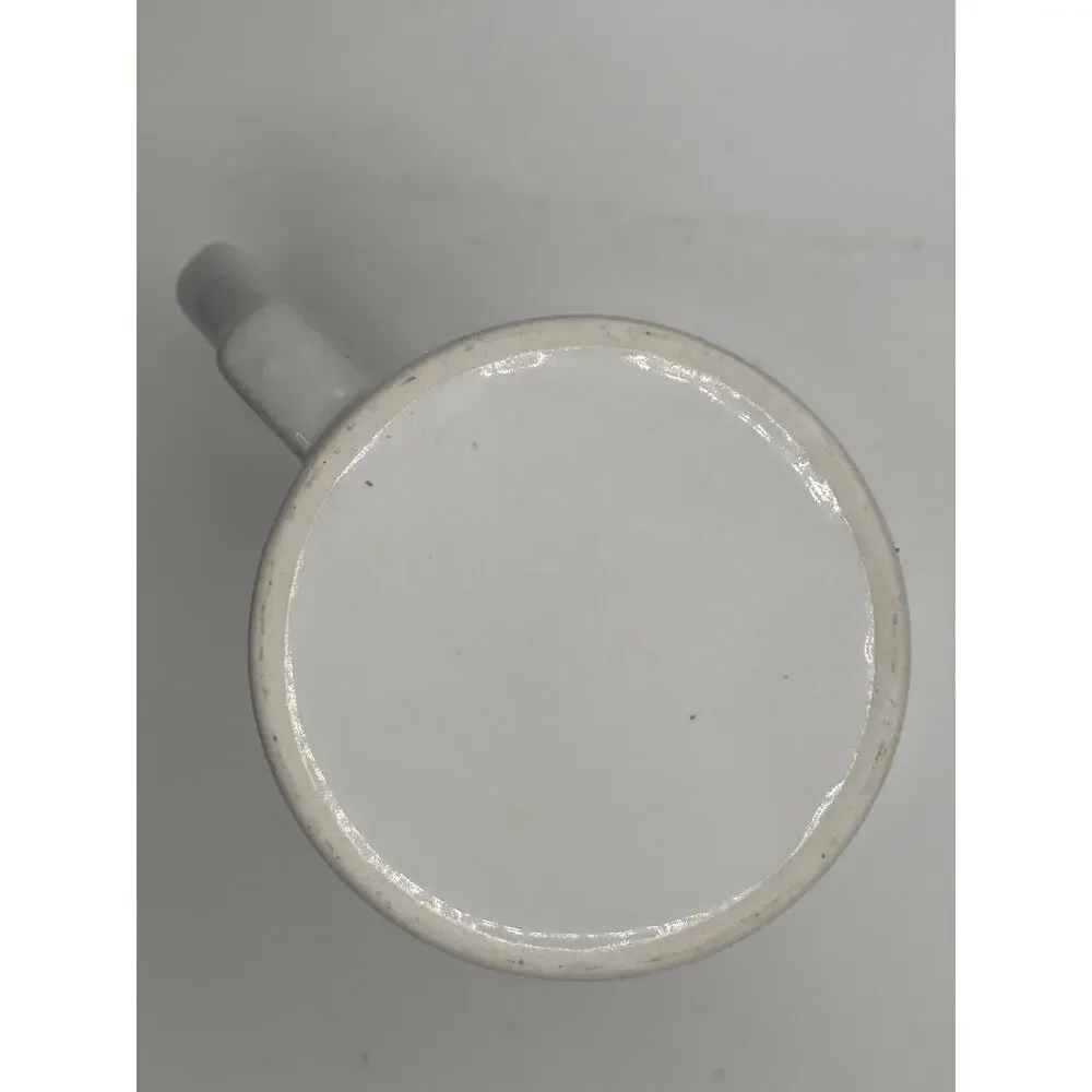 Very Unique Basketball Coffee Mug handle is the arm dunking basketball